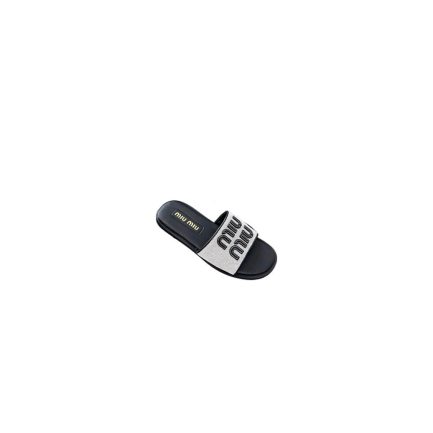 MiuMiu Canvas and leather slides